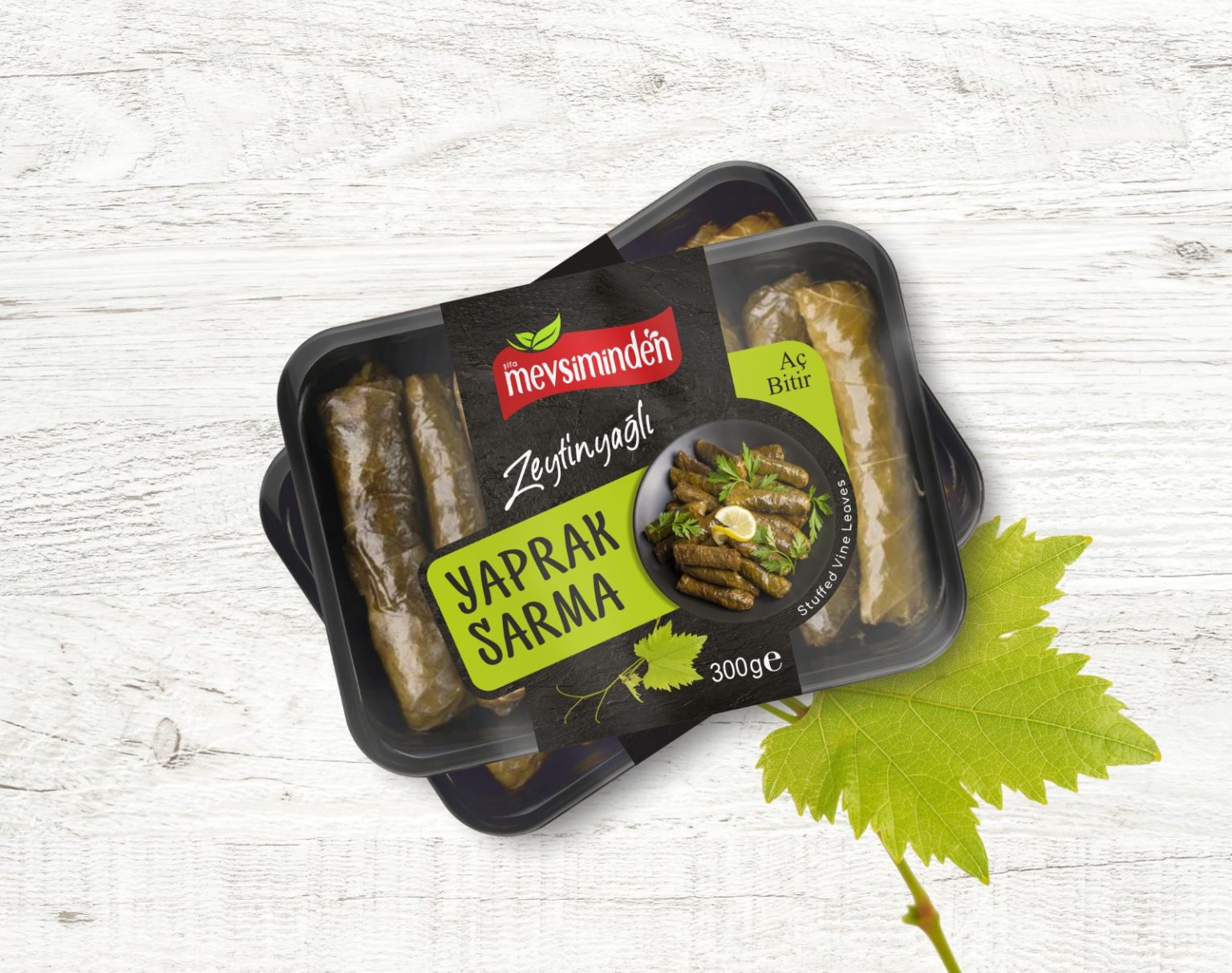 Seasonal olive oil stuffed vine leaves